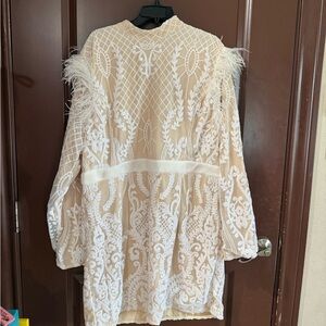 Elegant White Lace Dress with Feather Details